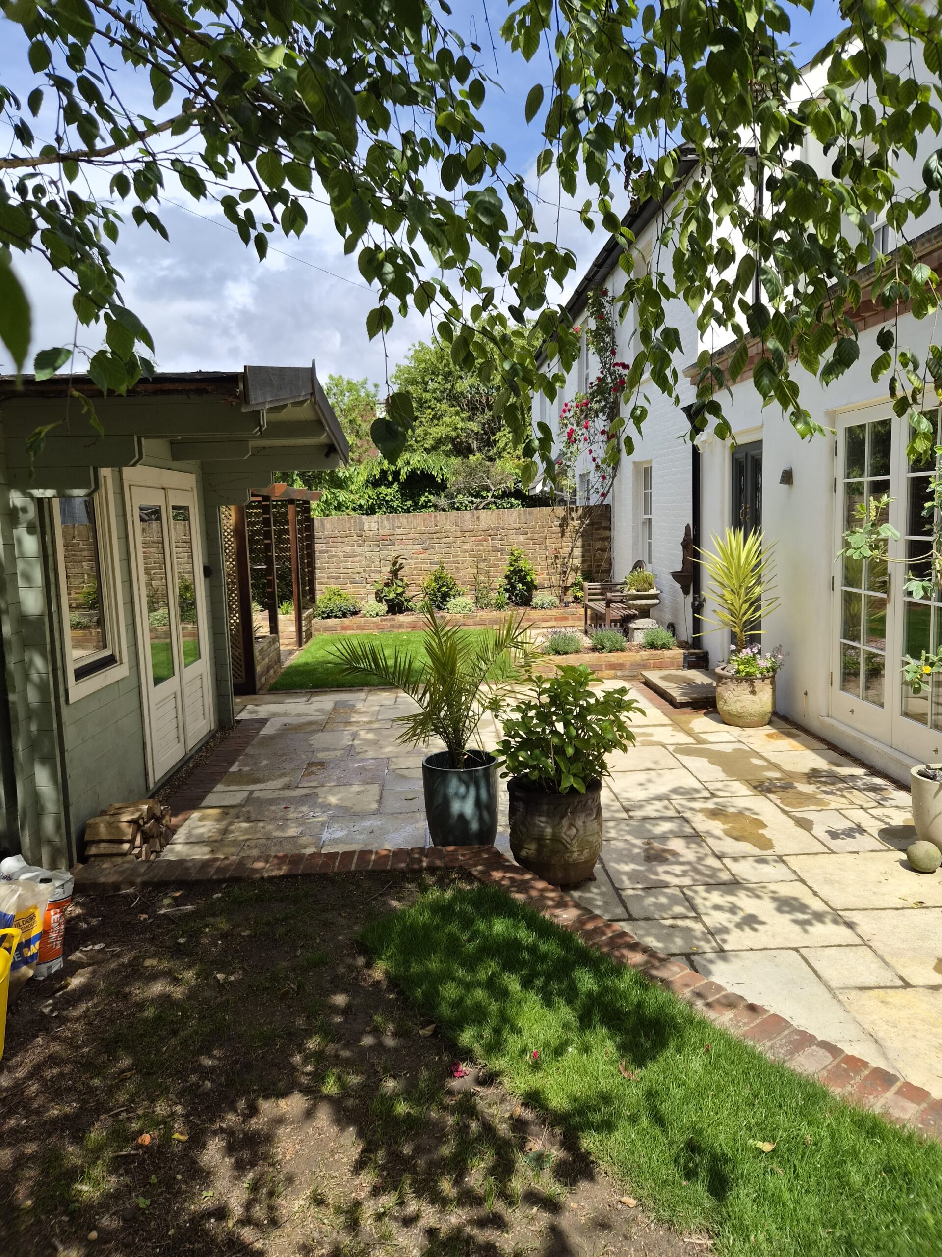 Garden design and build decking seating area in Surbiton